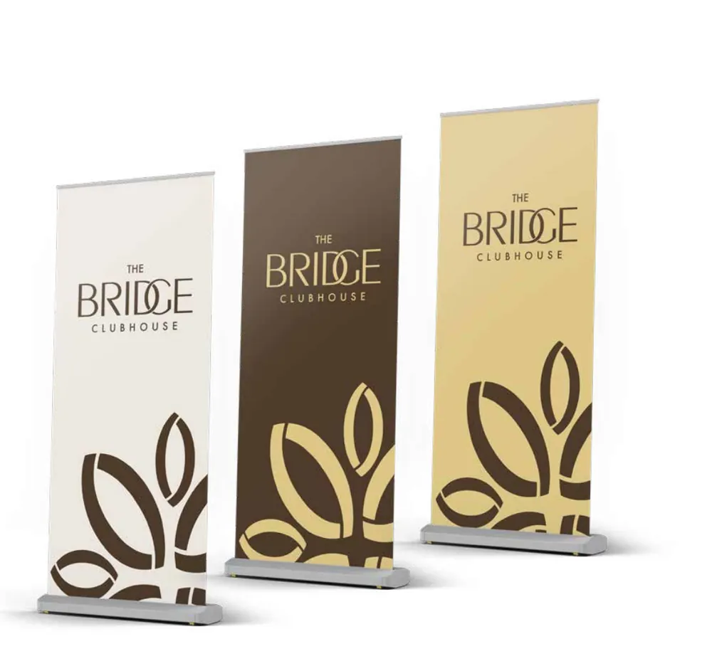 Roll-up banners, branded with The Bridge Clubhouse identity