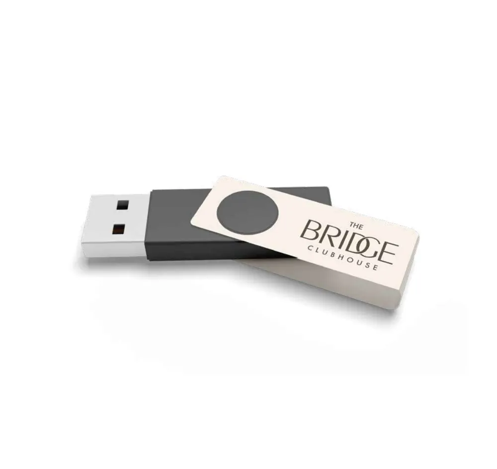 USB drive, branded with The Bridge Clubhouse identity